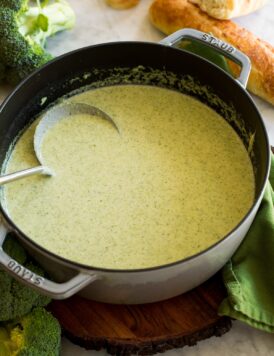 Pot filled with cream of broccoli soup.